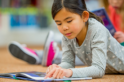 Child reading a book